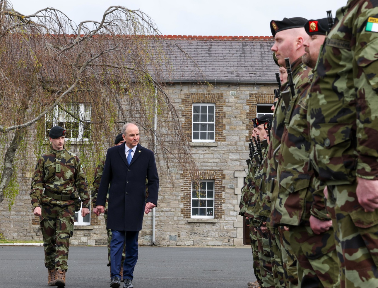 Micheál Martin reviewing the men and women of the 124th Infantry Battalion 